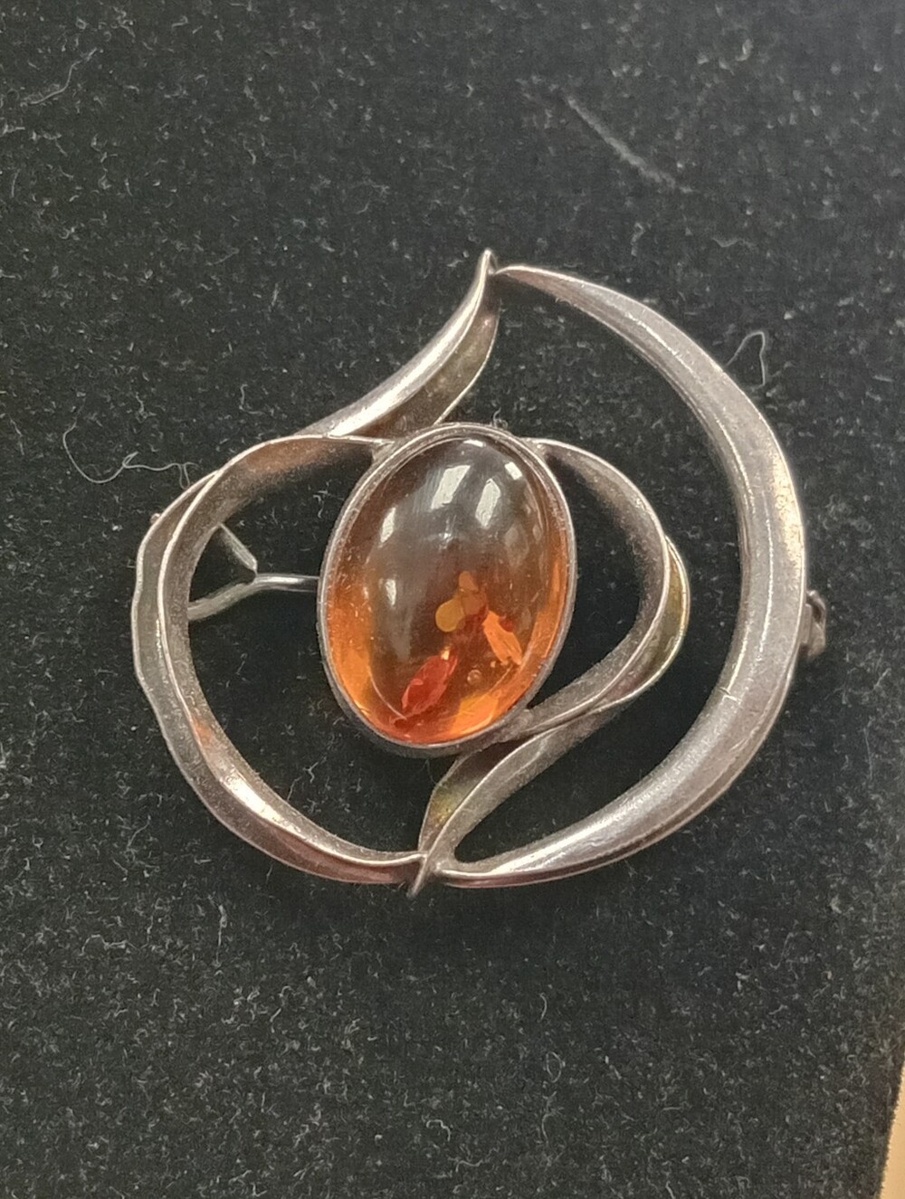 Amber Cabochon Silver Swirl Brooch - Elegant Orange Accent